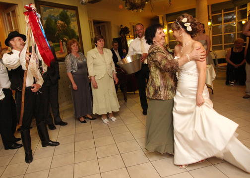 The bridal dance, which is the best tradition ever, everyone pays to dance with the bride